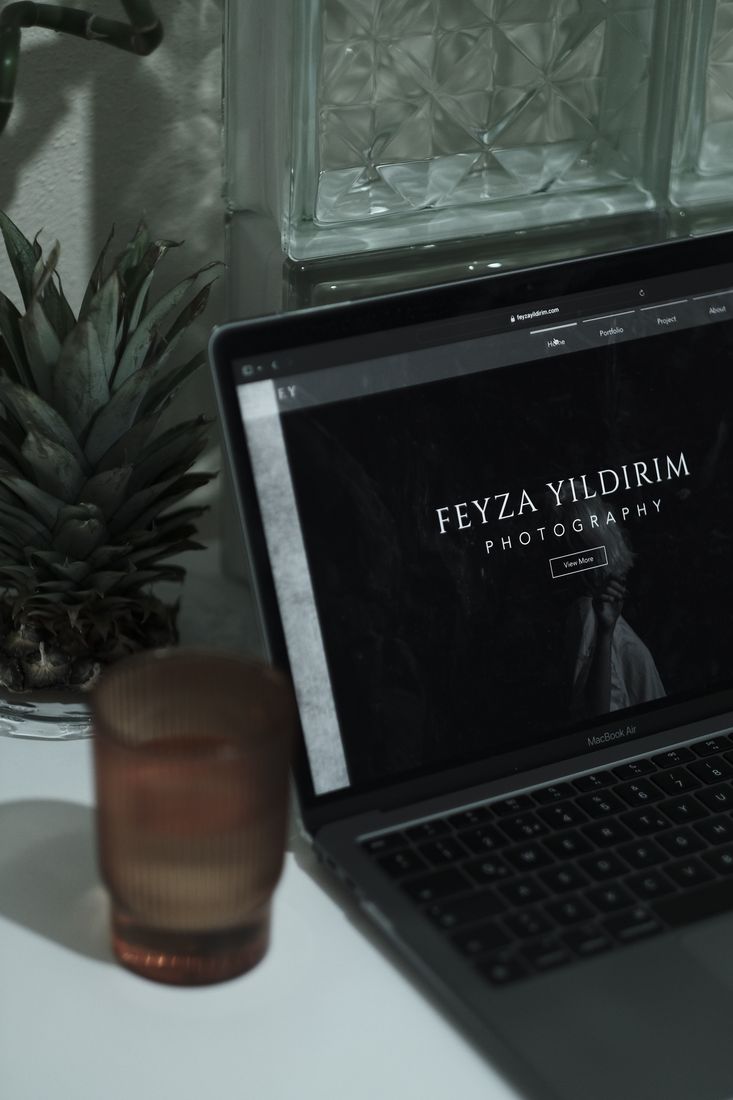 Laptop displaying a custom-designed website